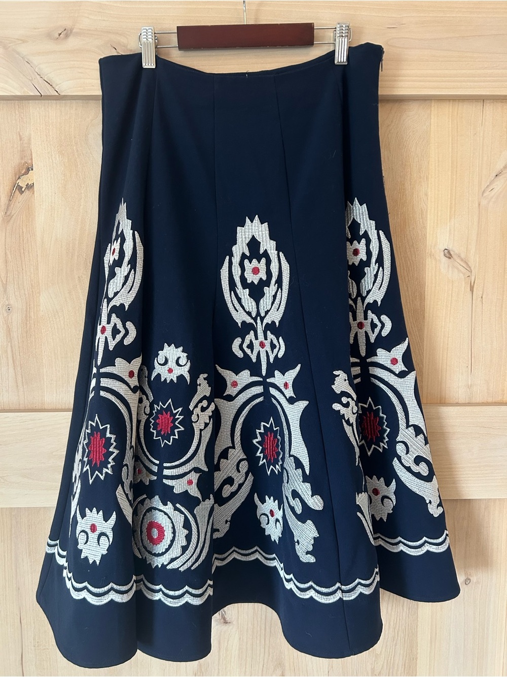 Sunny Leigh Navy Circle a-line Skirt with Cream and Red Embroidery, size 10